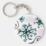 Abstrakt snöflingor nyckel ringar