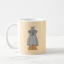 Apa i bruna Boots. Kaffe Muggar