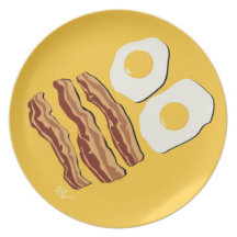 Bacon och ägg pläterar fest tallrikar