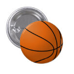 Basketboll knäppas knappar med nål