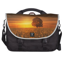 Baum im Sonnenuntergang Laptop Taschen