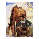 Cowboy som bevattnar hans häst vid NC Wyeth, vinta Vykort