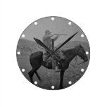 Cowboyjakt på skjuten hästrygg en väggklockor