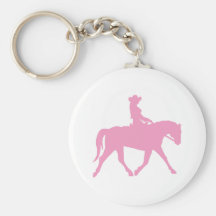 Cowgirl som rider henne häst (rosor) nyckel ringar