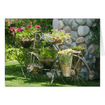 Cykel med blommor hälsnings kort