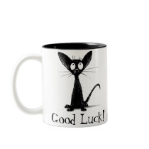 Den bra lyckasvartkatten rånar kaffe koppar