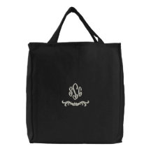 Den broderade monogramen hänger lös broderad tygkasse