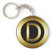 DEN GULD- MONOGRAMEN MÄRKER D