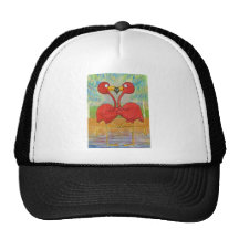 Den nyckfulla rosa flamingoen parar på strandökons baseball hat