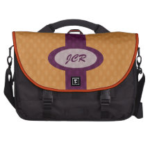 Den Retro ovalerMonogrampendlaren hänger lös - tan
