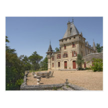 Den storartade Chateauen de Pressac och trädgård Vykort