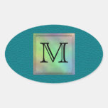Den utskrivavna beställnings- monogramen avbildar  ovala klistermärken