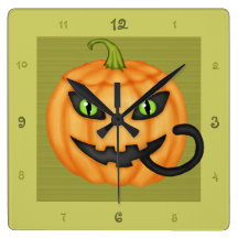 Det svart kattnederlag i pumpa Halloween tar tid p Klockor