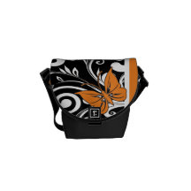 Fjärilen virvlar runt orangen kurir väska