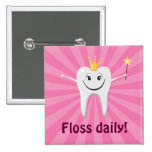 Floss dagligen tandfen på en rosa sunburst nål