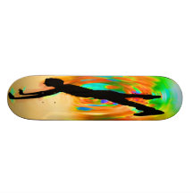 Gatadansen, silhouetten, grönt/orange/gulnar skate board