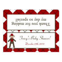 Godbiten hänger lös den röda sock monkey Argyle fö Vykort
