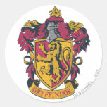 Guld- Gryffindor vapensköld som är röd och Klistermärke