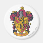 Guld- Gryffindor vapensköld som är röd och Magneter