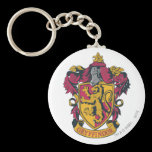 Guld- Gryffindor vapensköld som är röd och nyckelringar