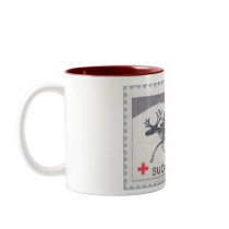 Julrenen rånar kaffe muggar