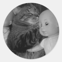 kattunge med dockaklistermärkear