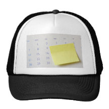 Klibbigt notera på kalender kepsar