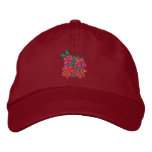 Konstlock: Hibiskusblommor. Rött broderade kepsar