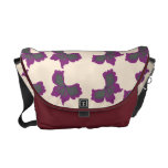 Konstnärlig fjärilsdesign över antik vit messenger bag