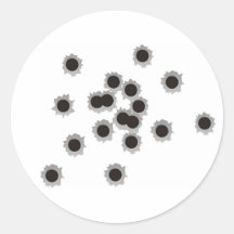 Kulhål från ett gevär eller ett vapen, eventuellt  klistermärke