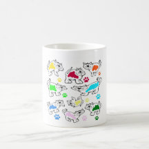 Kulöra katter på en kopp kaffe muggar