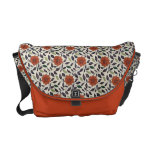 Lövrik orange blommigt messenger bag