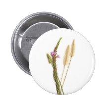Luddigt och lila blommor med gröna stems nål