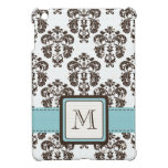 Monogrammed blått- och bruntdamast