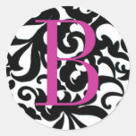 Monogrammed svartvit klistermärke
