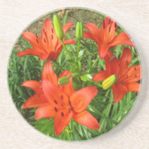 Orange lilja underlägg för glas