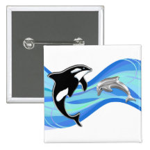 Orca och delfin i vågar knappar