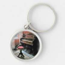 Organ med Petit pekar pallr Nyckelring