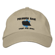 Pekingese härskar den broderade hatten