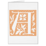 Prickigt orange brev en Monogram Hälsningskort