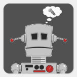 Roboten skruvar klistermärken