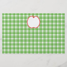 Röda Apple. Med grönt- och vitkontrollbakgrund Flygblad Designs