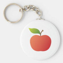 Rött äpple med den lövkeychain eller nyckelringen