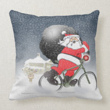 Santa som cyklar med säcken, och snö kudder