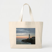 Sentinal på solnedgången tote bags