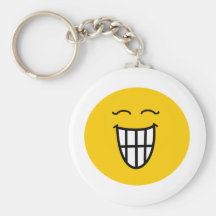 Smiley som skrattar med toothy leende nyckel ring