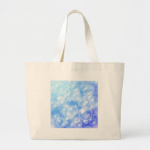 Suddigt bubblar över blått tote bags