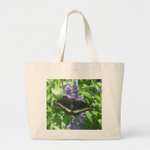 svart fjärilstoto tote bags