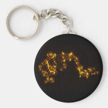Svart och guld- virvla runt musik noter Keychain Nyckelring