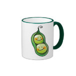 Två ärtor i en pod kaffe kopp
